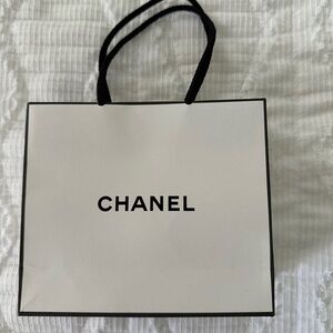 CHANEL Classic White Tote with Black Accents